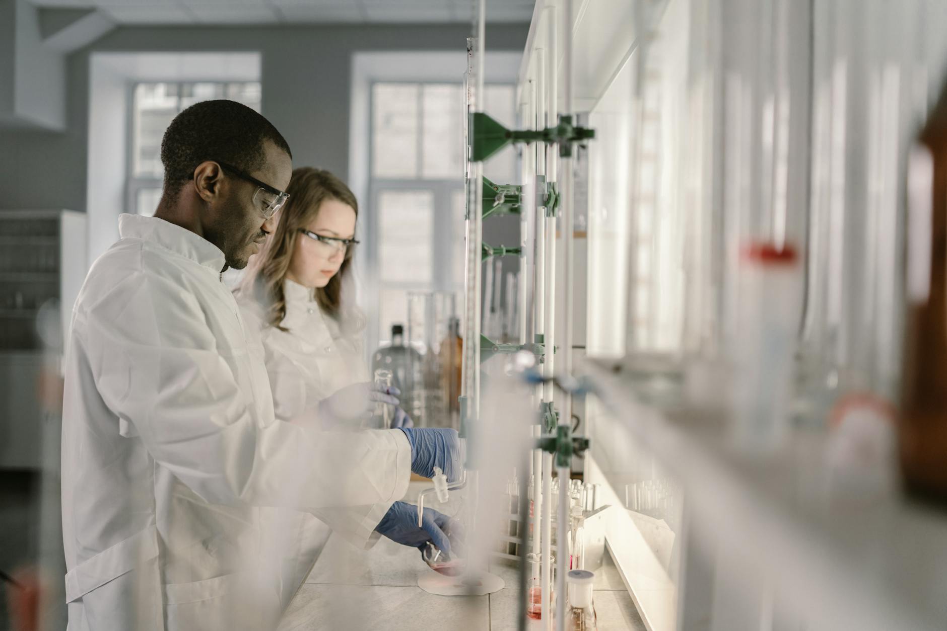 Advances in Acid and Post-Graphitization Treatments for Mesophase Pitch-Based Carbon Fibers: A Review