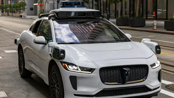 NMLoNet: An End-to-End Intelligent Vehicle Localization Network Using Navigation Maps
