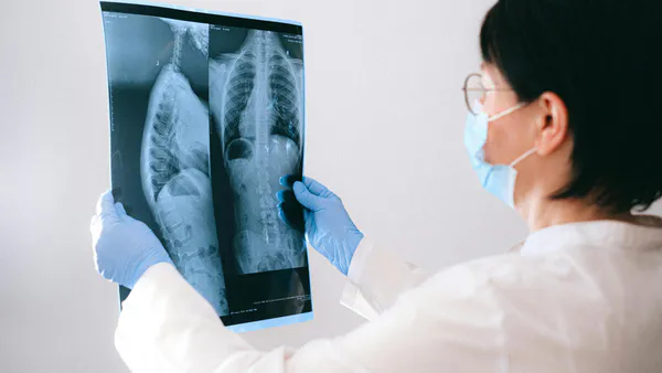 Readability and Comprehension in Radiology Reports and Patient Education: A Comprehensive Review