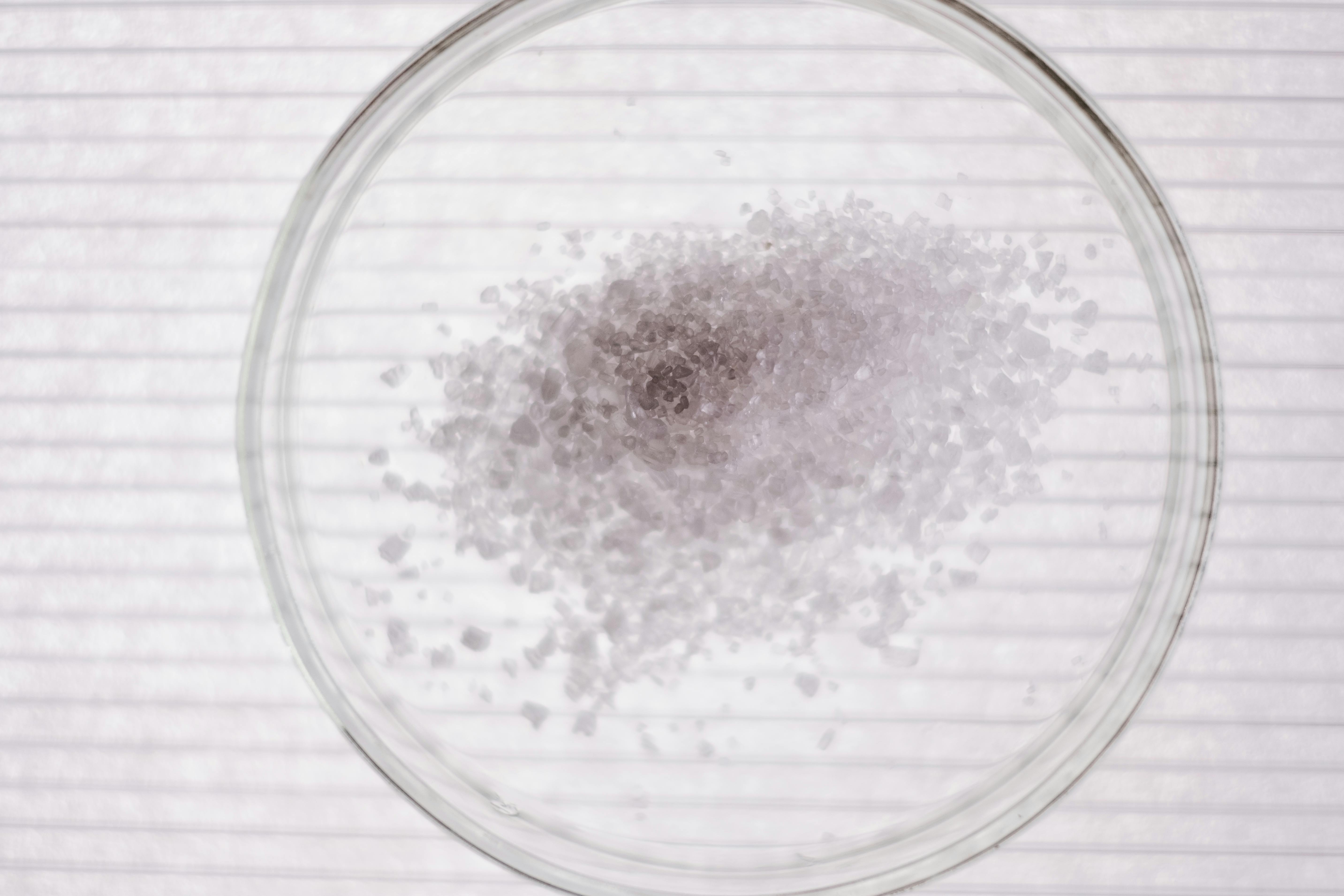 Two-Dimensional Nucleation in the Dislocation Model of Crystal Growth