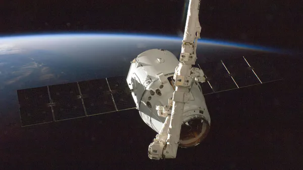 Survival of Plants Seeds and Bacteria in a Picosatellite Sent to the Stratosphere