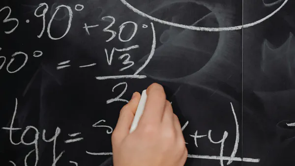 A Classical Interpretation of the Universe Extrapolated from the Fine Structure Constant (α)