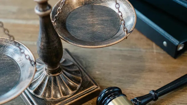 Taxing Access to Justice: Legal Analysis of Judicial Fees in Brazil and the Dialectics of Legal Aid in Comparative Perspective