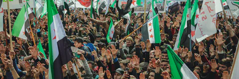 America Intervention Efforts to Democratize Iraq and Syria ahead of the Arab Spring through forwarding Strategy for Freedom In the Middle East (2003-2013)