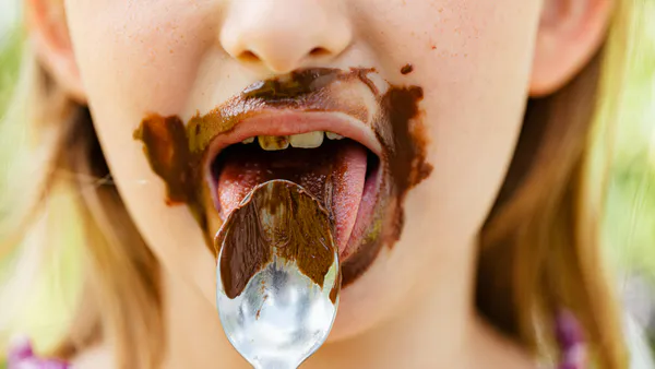 The Chemoperception of Primary Flavors and Its Relationship With Adiposity in Young Adults