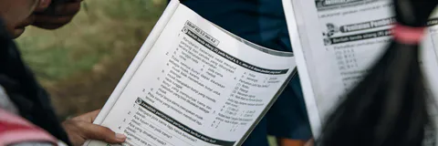 Brazilian National Textbook Program: The Pedagogical Assessment of Mathematics Textbooks as Exam  Technology