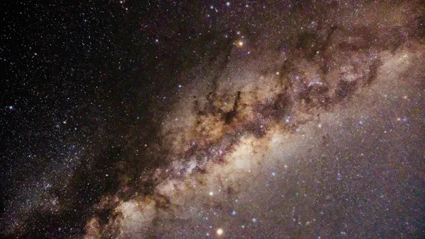 Relativistic Exploration of Dark Matter Effects in Rotating Galaxy, Studied Fluid-Dynamically