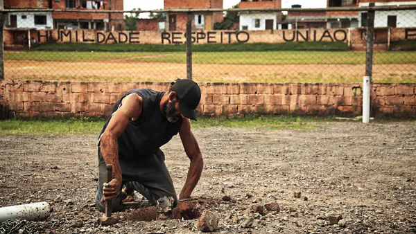 Interconnections Between Socio-Spatial Justice Theories and Social Housing Production in Brazil